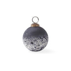 BLACK AND WHITE GLASS ORNAMENT